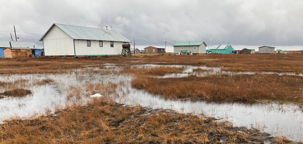 Buildings on land flooded with water